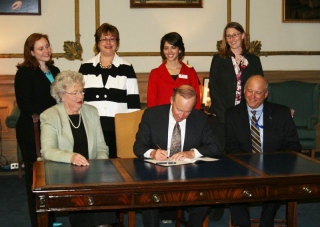 Indiana Governor Mitch Daniels held a ceremonial bill signing