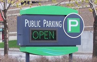 Parking sign near Headwaters Park.