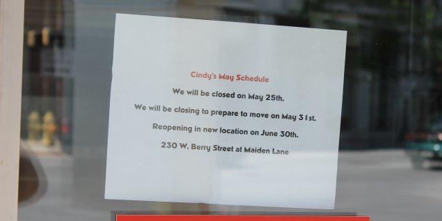 Sign in Cindy's Diner window announcing closure